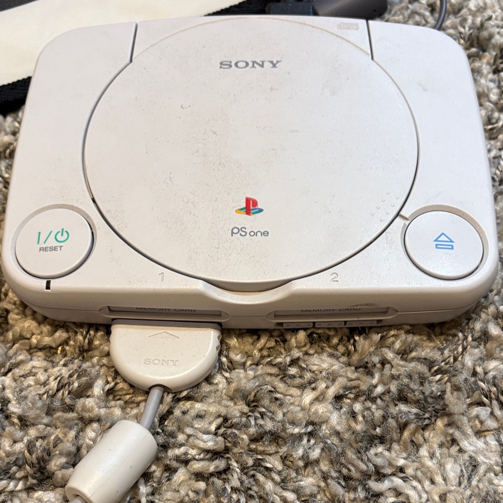 Sony PlayStation Console with White and Gray Design (everything included)